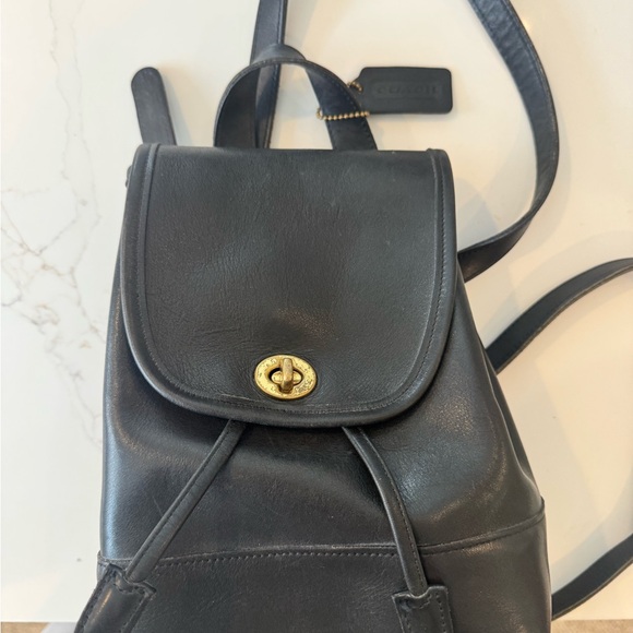 Coach Handbags - Vintage Coach Black Leather Turnlock Mini Backpack